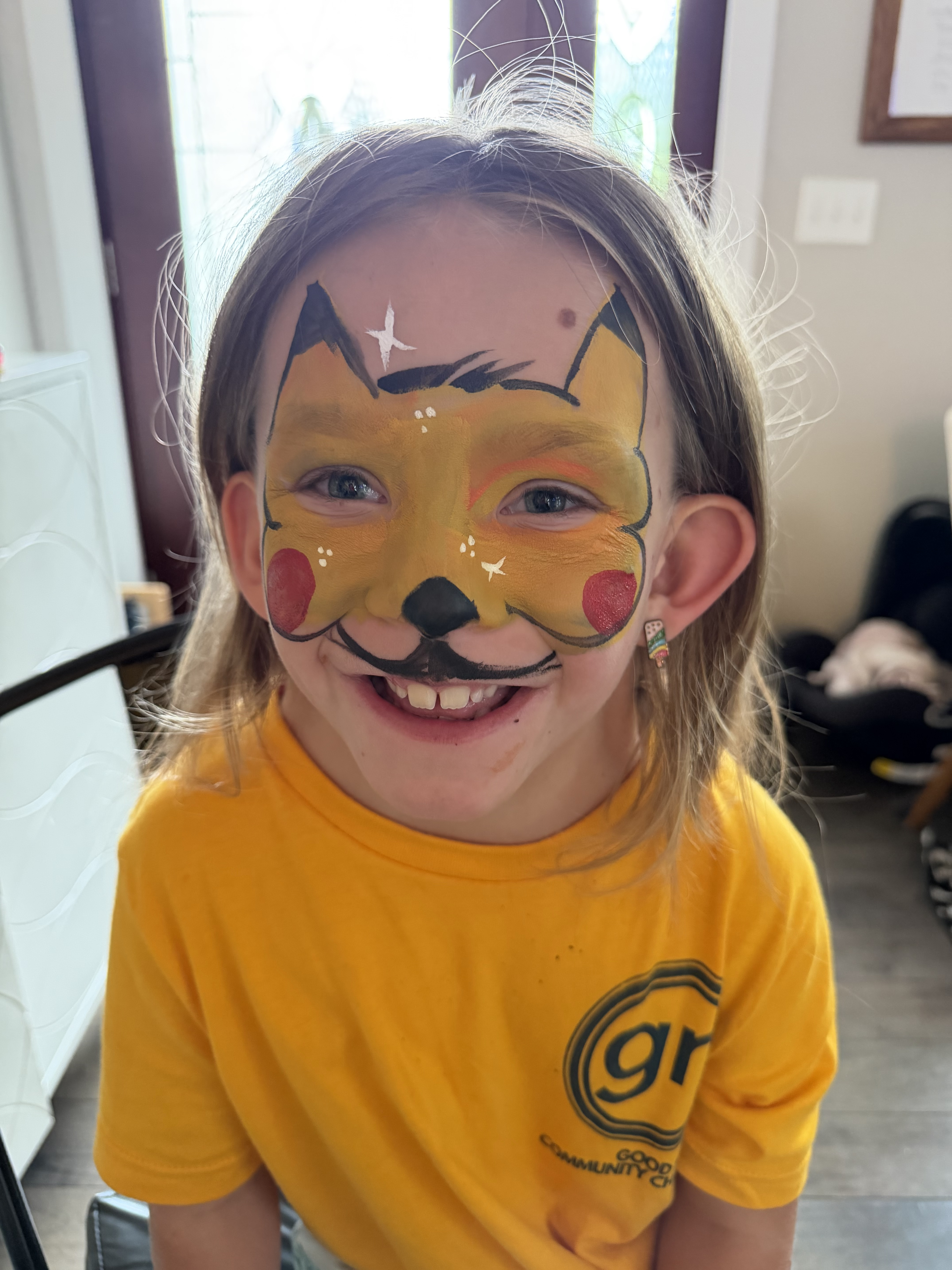 Pikachu face paint design